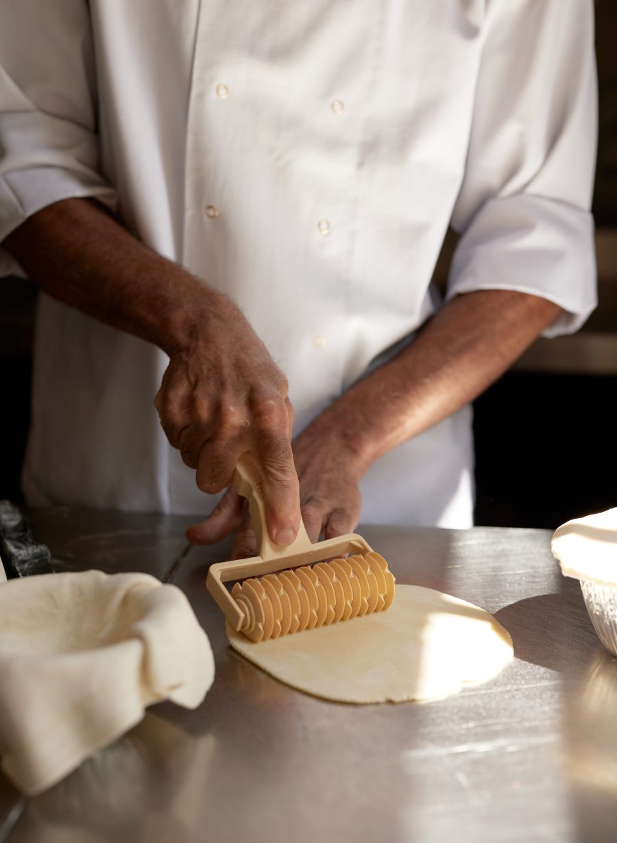 chef preparing food in kitchen