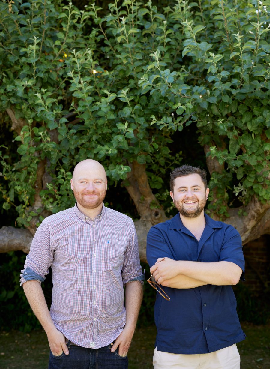 pub team members posing outside venue