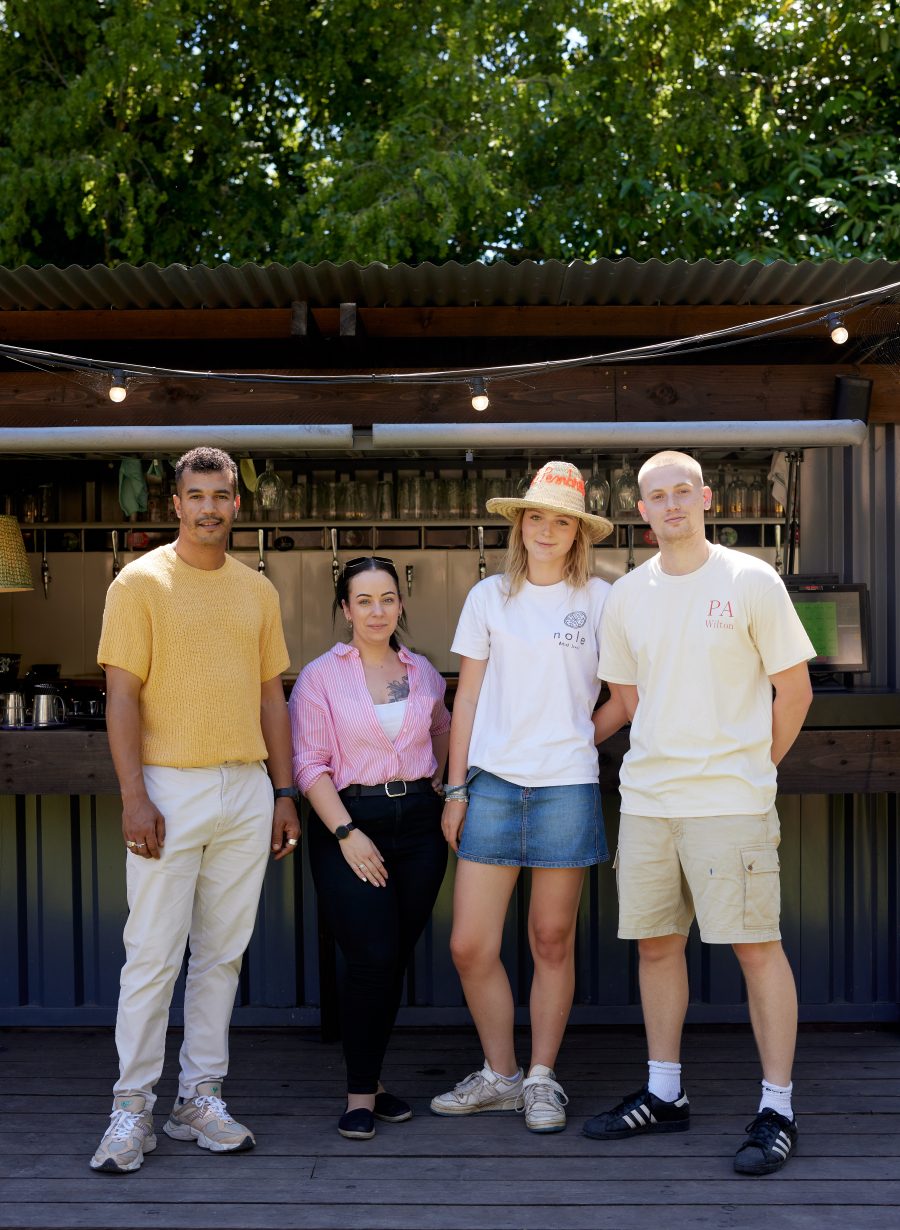staff group at pub entrance