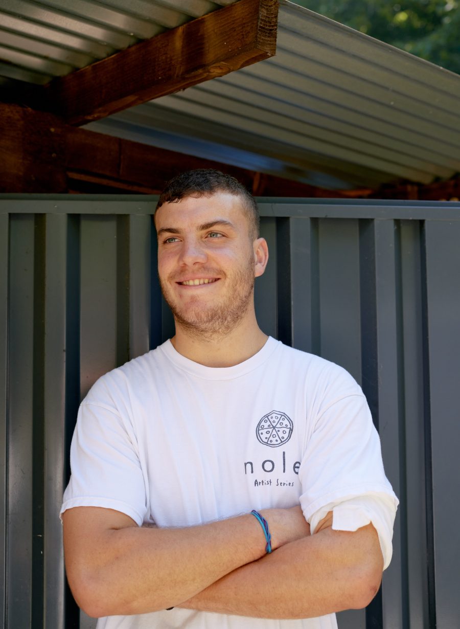 team member standing outside the pub