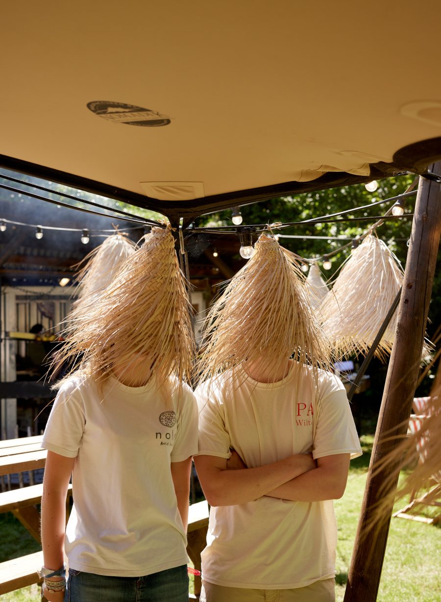 welcoming staff members at pub entrance